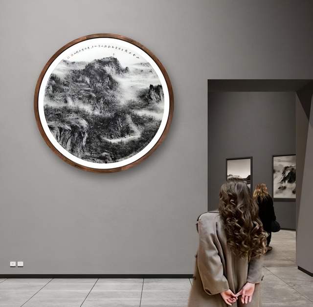 A work by He Zhenquan hanging on a gallery wall